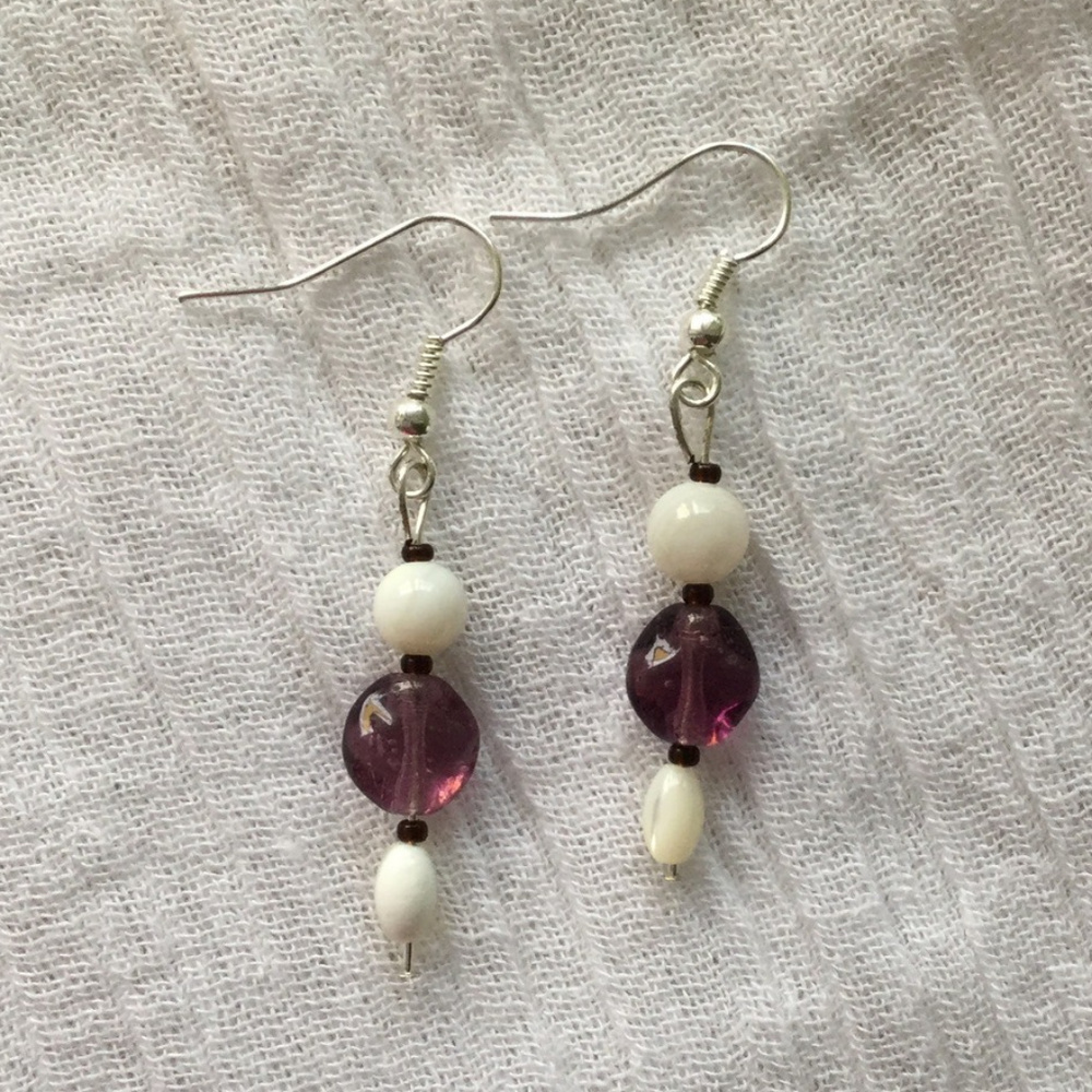 White and purple dangle earrings